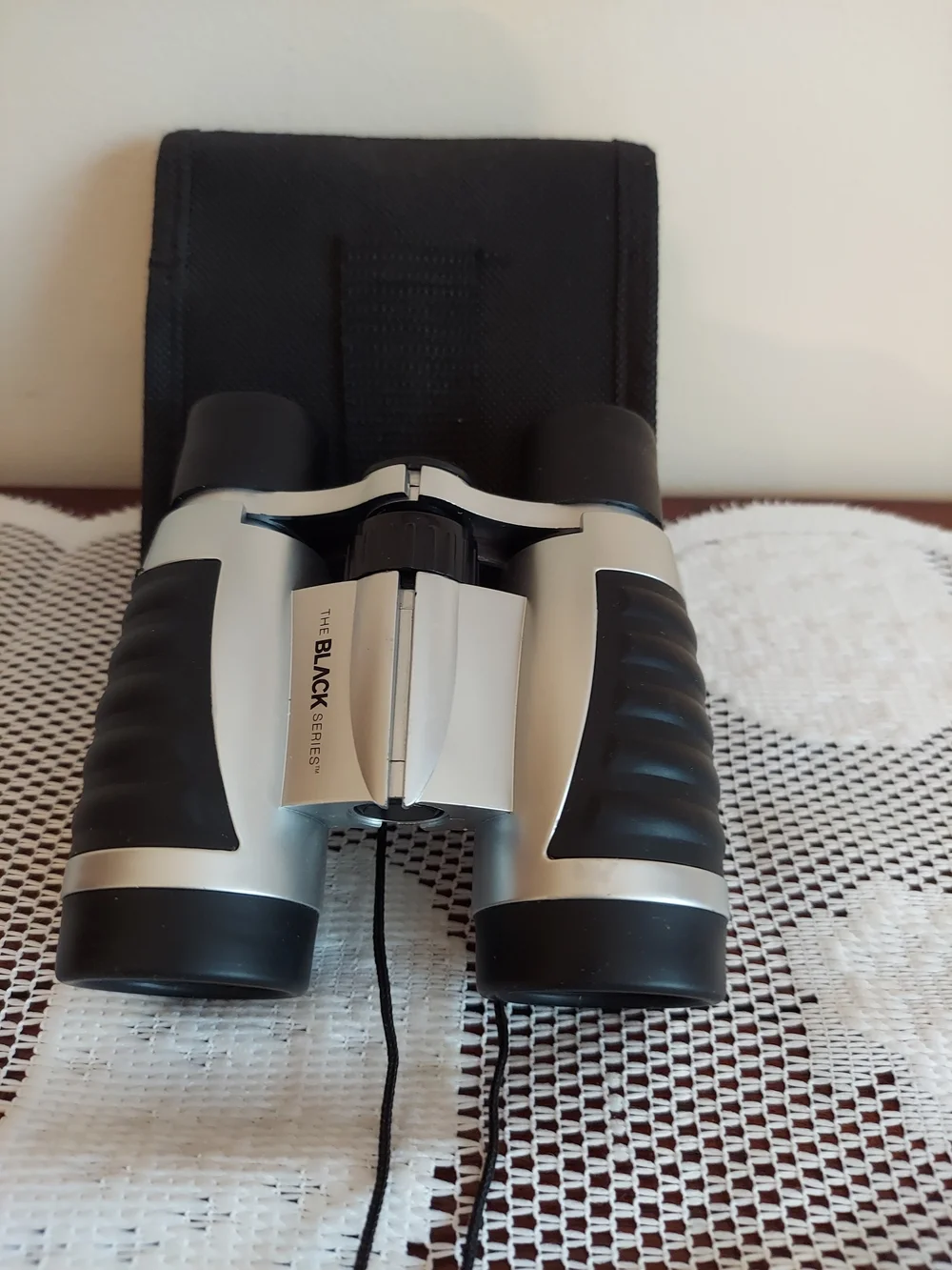 Silver and Black Compact Binoculars -